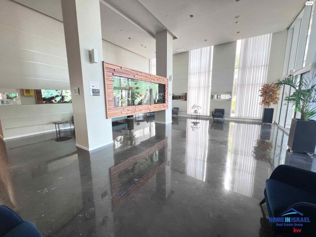 Modern luxury lobby with high ceilings in a residential tower in Netanya