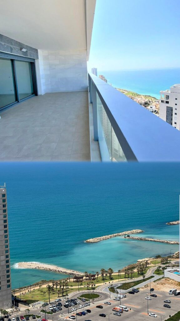 Panoramic sea view from the high floor of Cliff Tower 1, showing the Mediterranean coastline and luxury balcony at sunset.