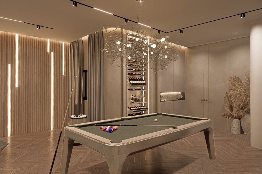 A luxury entertainment room with a professional billiard table, a modern sit-up bar, and soft lighting