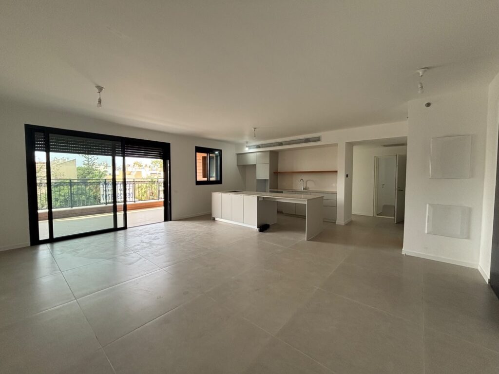 Upgraded kitchen featuring a large central island