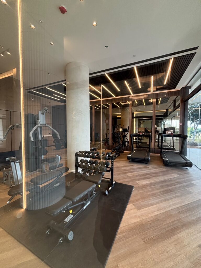 Luxurious entrance lobby and landscaped seating areas at Briga Einstein